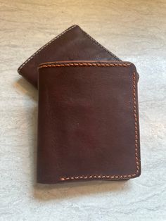 This beautifully handcrafted leather wallet combines timeless style with practical functionality. Made from high-quality, durable leather, this wallet features: A rich, brown color that ages beautifully with use. Fine, contrasting stitching that adds a touch of elegance and ensures durability. Multiple card slots to keep your essentials organized and easily accessible. A compact and minimalist design that fits comfortably in your pocket. Handcrafted Leather Wallet, Contrasting Stitching, Clip Wallet, Leather Bifold Wallet, Aging Beautifully, Nov 2, Money Clip Wallet, Bifold Wallet, Handcrafted Leather