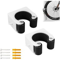 two white and black bike parts with screws