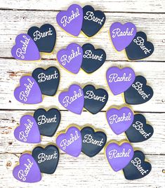 heart shaped cookies with names on them are arranged in the shape of hearts that spell out their names