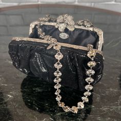 Clara Kasavina Black Snake And Crystal Bag Pull Closer And Crystal Chain For Wrist Wearing. Silver Handheld Evening Bag With Chain Strap, Handheld Silver Evening Bag With Chain Strap, Silver Evening Bag With Detachable Strap For Party, Glamorous Evening Shoulder Bag With Silver-tone Hardware, Party Shoulder Bag With Detachable Strap In Silver, Elegant Silver Bag With Chain Strap, Glamorous Formal Shoulder Bag With Silver-tone Hardware, Party Shoulder Bag With Detachable Silver Strap, Party Silver Shoulder Bag With Detachable Strap