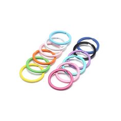 six different colored rubber rings on a white background