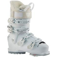 a pair of white ski boots on a white background