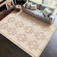 a living room filled with furniture and a large rug