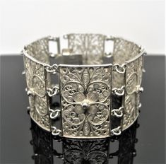 Magnificent antique jewelry created with precision craftsmanship.  SILVER marked 800 FILIGREE BRACELET handcrafted  Byzantium style  vintage  antique length: 6 3/4 inches, 17 cm A fine gift for life Formal Vintage Jewelry With Historical Design, Traditional Formal Jewelry With Historical Design, Ceremonial Vintage Jewelry With Historical Design, Vintage Ceremonial Jewelry With Historical Design, Ornate Rectangular Engraved Jewelry, Vintage Jewelry With Intricate Design For Collectors, Vintage Collectible Jewelry With Intricate Design, Formal Vintage Bracelet With Intricate Design, Elegant Formal Bracelet With Antique Finish