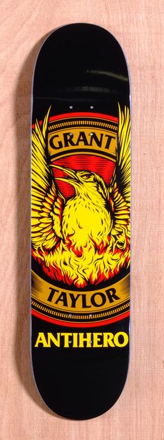 a black skateboard with an image of a bird and the words grant taylor's anthero on it