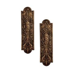 pair of decorative wall sconces in bronze finish