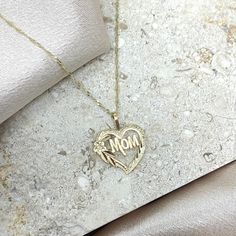 14k Real Yellow Gold Mom Heart Pendant with 0.9mm Singapore Chain, 14k Gold Mother Charm Necklace, Mother's Day Gift, Gift for mom ★DETAILS★ (Pendant) - Material : 14k Gold - Height : 17mm - Width : 15 mm - Weight : 0.6 gram -Single Sided ＊Weights and Dimensions are approximate (Chain) - Material : 14k Gold - Clasp : Spring Ring   - Width : 0.9 mm ＊Weights and Dimensions are approximate **If you are looking for different chain, Please Contact me:) Happy to help:) ★WHAT'S INCLUDED★ - 14k Pendant Mother's Day Heart Cut Necklace Stamped 14k, 14k Gold Open Heart Jewelry For Mother's Day, Stamped 14k Heart Cut Jewelry For Mother's Day, Fine Jewelry 14k Gold Heart Necklace For Mother's Day, Silver Heart Necklace In 14k Gold For Mother's Day, Mother's Day 14k Gold Heart Necklace, Mother's Day Open Heart Diamond Cut Jewelry, Mother's Day Open Heart Diamond Cut Necklace, Diamond Cut Heart Pendant Necklace For Mother's Day