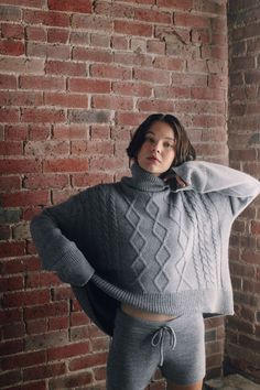 Model wearing oversized cable sweater in light grey alpaca wool, front Knit Sweater Patterns, Oversized Cable Knit Sweater, Cable Knit Sweater Pattern, Alpaca Poncho, Knit Baby Dress, Oversized Turtleneck Sweater, Cable Knit Turtleneck Sweater, Sweater Patterns, Oversized Turtleneck