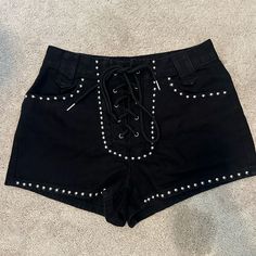 Size 4, Never Worn Perfect Condition Studded Jean Shorts, Edgy Black Jean Shorts For Spring, Edgy Black Shorts For Spring, Edgy Black Bottoms With Built-in Shorts, Black High Waist Edgy Shorts, Black Mid-rise Shorts For Night Out, Edgy High-waisted Black Shorts, Black Spring Jean Shorts, Edgy Black High-waisted Shorts