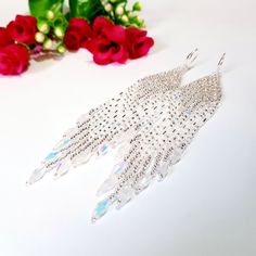 Wedding Long Fringe Earrings.Silvery And White Color. Swarovski Crystals Earrings. Sparkling, Gentle Seed Beads, Indian Jewelry. Beautiful Gift For Women. Gradient long fringe bead tassel earrings . Gradient bead Waterfall earrings.Boho style Seed Beads earrings.Long dangle earrings. Beautiful, Elegant Earrings .A beautiful Christmas gift for women and girlfriend. These are long but not heavy earrings. Length of earrings 13,5cm (5 inches). Width of earrings 0.78 inches. To create these earrings Sparkling Crystal Earrings As Gift, Silver Crystal Chandelier Earrings For Anniversary, Silver Beaded Earrings For Evening, Sparkling Silver Crystal Bridal Earrings, White Crystal Long Drop Earrings, Beaded Teardrop Jewelry For Evening, Dazzling White Dangle Crystal Earrings, Dazzling White Crystal Dangle Earrings, Silver Handmade Beaded Earrings For Party