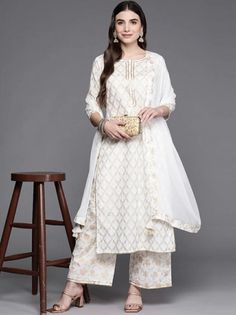 HAND CRAFTED KURTA SET DESCRIPTION *Women Off White Ethnic Motifs Printed Gotta Patti Kurta with Palazzos & With Dupatta Indian Wedding Wear Salwar Kameez / Indian Ethnic Dress / Cotton Kurta Set / Plus Size Silk Kurta Dress Traditional Indian Wear / Salwar Kameez Dupatta / Kurti Palazzo Set *Off white printed Kurta with Palazzos with dupatta *Kurta design:- * Ethnic motifs printed * Straight shape * Regular style * Round neck, three-quarter regular sleeves * Gotta patti detail * Calf length len White Salwar Kameez With Resham Embroidery For Celebration, White Resham Embroidery Salwar Kameez For Celebrations, White Salwar Kameez With Zari Work For Celebration, White Fitted Sharara For Eid, Unstitched White Salwar Kameez For Celebration, White Semi-stitched Self-design Anarkali Set, White Semi-stitched Self Design Anarkali Set, White Semi-stitched Sets For Celebration, White Salwar Kameez For Festival Celebrations