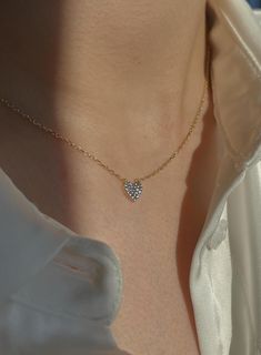 The 14K Solid Gold Minimalist Heart Necklace is a timeless symbol of love and elegance. Expertly crafted with attention to detail, this delicate necklace features a tiny heart pendant encrusted with sparkling gemstones. Perfect for gifting, it's an ideal choice for your girlfriend, mom, or anyone special in your life, whether for a birthday, Christmas, or any memorable occasion. Made with high-quality 14K gold, this piece exudes beauty and sophistication. With its understated charm, this necklac Heart Necklace Gold, Tiny Heart Necklace, Timeless Symbol, Gold Heart Necklace, Gift Love, Tiny Heart, Symbol Of Love, Love Necklace, Delicate Necklace