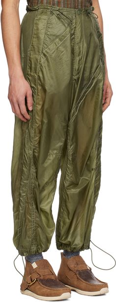 Semi-sheer polyester ripstop trousers. · Snocord® bungee-style drawstring at waistband · Four-pocket styling · Zip-fly · Darts at knees · Snocord® bungee-style drawstring at cuffs and outseams · Embroidered eyelets at back pocket · Contrast stitching in white Supplier color: Olive India Arie, Contrast Stitch, Back Pocket, Apparel Accessories, Stitching, Trousers, Outfit Accessories, Pants, Clothes