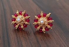 sizes in terms of height and weight are mentioned in grams and inches in the photo Red Gold-plated Earrings For Festivals, Red Gold Plated Earrings For Festivals, Festive Red Gold-plated Earrings, Formal Gemstone Earrings For Diwali, Gold Chandbali Earrings With Jewels, Festive Hallmarked Earrings For Puja, Gold Plated Round Earrings For Puja, Elegant Earrings For Diwali Puja, Elegant Earrings For Puja And Diwali