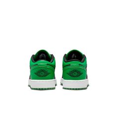 Black leather upper with bold Lucky Green accents, blending street style and sports vibes effortlessly. Nike Jordan 1, Lucky Green, Sneaker Games, Genuine Leather Shoes, Air Jordan 1 Low, Jordan 1 Low, Green Accents, Air Jordan 1, Nike Jordan