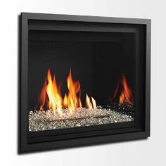 a wall mounted fireplace with flames in it