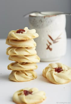 a stack of cookies sitting on top of a white table