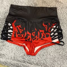 Sexy Black And Red Flame High Wasted Shorts With Open Criss Cross Design On The Sides! Nwt S But Fits Like An Xs Edgy Stretch Shorts For Club, Black Summer Club Shorts, Casual Red Club Bottoms, Casual Red Bottoms For Club, Edgy Stretch Shorts For Summer, Edgy Stretch Summer Shorts, Red And Black Emo, Red Top Outfit, Black One Piece Jumpsuit