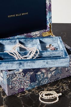 "A jewelry box is the keeper of your dreams," says Sophie Bille Brahe. "I tried to encompass this dreaminess when creating my boxes. It's one's dearest treasure." This 'Trésor Grande Hawaii' version is crafted from floral-print voile sourced from London's iconic Liberty store and has a plush velvet interior divided into four compartments. Jewlery Storage, Hawaii Jewelry, Sea Jewelry, Sophie Bille Brahe, Velvet Interior, Velvet Interiors, Velvet Jewelry, Concept Board, Navy Velvet