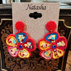 Beaded Flower Dangle Earrings By Natasha New With Tag Super Cute & Lightweight Mixed Beads Of Multiple Colors With Blue Faceted Rhinestone In Center Felt Back Post Closure 2.5” Long Dangle 2” Wide Red Drop Flower Earrings For Festive Occasions, Handmade Red Flower Earrings For Festive Occasions, Festive Red Flower Drop Earrings, Red Beaded Flower Shaped Jewelry, Adjustable Red Flower Beaded Earrings, Handmade Beaded Earrings With Flower Shape For Party, Handmade Flower Shape Beaded Earrings For Party, Handmade Flower-shaped Beaded Earrings For Party, Festive Red Flower Earrings