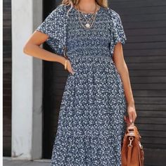 This Floral Navy Blue Summer/Spring Dress Can Be Dressed Up Or Down! It's A Size M (Us 8-10) With An Elastic Smocked Top, Pleated Aline, And Flutter Sleeves. It's Lightweight And Easily Packable. Very Soft, 100% Polyester. New With Tags, Never Worn. Blue Mid-length Ruched Dress, Casual Blue Maxi Dress With Smocked Bodice, Blue Knee-length Dress With Smocked Back, Blue Maxi Length Smock Dresses, Blue Flowy Midi Maxi Dress, Blue Non-stretch Bohemian Midi Dress, Flowy Mid-length Blue Maxi Dress, Non-stretch Blue Dresses For Brunch, Blue Bohemian Non-stretch Midi Dress