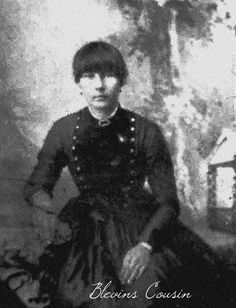 an old black and white photo of a woman