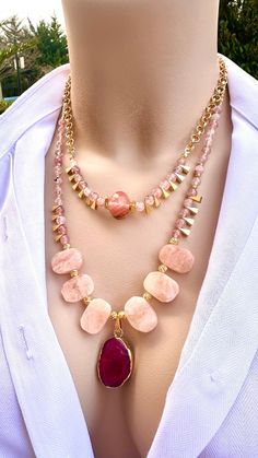 Morganite,Rose Quartz,Strawberry Quartz Layered Necklace Set with Agate Pendant and 14K Gold Plated Chain and Accents Inner Necklace : 17 inches long Outer Necklace: 22 inches long Morganite; is connected to the heart and is attuned to the heart chakra. It is believed to bring healing, compassion and promise to those who wear it. Rose Quartz; strengthens and balances the physical heart and circulatory system, and releases impurities from body fluids. A god energetic support for those with leukaemia. Strawberry Quartz; is the stone of love, joy, and emotional healing, helping to open the heart chakra and foster a sense of compassion, kindness, and forgiveness. Agate;transforms negative energy into positive energy. It enhances mental function, improves concentration, enhances perception and Pink Rose Quartz Gemstone Beaded Necklaces, Rose Quartz Gemstone Necklace For Valentine's Day, Rose Quartz Pendant Necklace With Gemstones, Long Outer, Pink Agate Necklace, Hand-strung Pink Rose Quartz Necklace, Gift For Mothers Day, Layered Necklace Set, Elegant Necklace