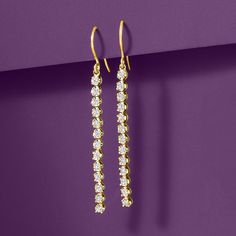 Ross-Simons - .50 ct. t. w. Diamond Linear Drop Earrings in 14kt Yellow Gold. These dazzling drop earrings will fill your day with shimmer and shine! .50 ct. t. w. round brilliant-cut diamonds glisten from the ear in a linear design in polished 14kt yellow gold. Hanging length is 2 1/8". Earwire, diamond linear drop earrings. Diamond birthstones are the perfect gift for April birthdays. Classic Diamond Accents Linear Drop Earrings, Classic Gold Linear Earrings With Brilliant Cut, Gold Linear Anniversary Earrings With Prong Setting, Classic Prong Set Linear Earrings For Evening, Classic Evening Linear Earrings With Prong Setting, Yellow Gold Linear Earrings With Brilliant Cut For Wedding, Wedding Linear Earrings In Yellow Gold With Brilliant Cut, Diamond White Long Drop Earrings For Anniversary, Gold Linear Earrings With Prong Setting For Anniversary