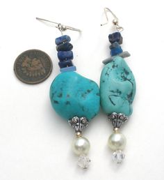 Hand Made Statement Jewelry - This is a substantial pair of silver dangle drop pierced earrings with large turquoise nuggets, blue sodalite, faux pearls and aurora borealis crystal beads. They 3.25" long and are slightly over .75" wide and weigh 25.6 grams. Blue Pearl Drop Bohemian Earrings, Blue Bohemian Pearl Drop Earrings, Bohemian Blue Gemstone Earrings, Aurora Borealis Crystal, Blue Sodalite, Vintage Turquoise, Earrings Vintage, Pierced Earrings, Aurora Borealis