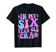 a black shirt that says in my six year old era