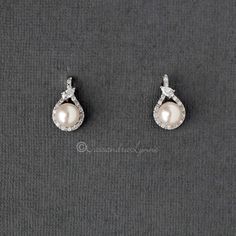 CZ Wrapped Ivory Pearl Stud Earrings - Cassandra Lynne Pear-shaped Pearl Drop Bridal Earrings In White Gold, Classic White Pear-shaped Bridal Earrings, Classic Pear Shaped Bridal Earrings, Delicate White Pear-shaped Bridal Earrings, Pear-shaped White Bridal Earrings For Anniversary, Classic Pear-shaped Bridal Earrings For Anniversary, White Gold Pear-shaped Teardrop Earrings For Wedding, White Gold Pear-shaped Earrings For Wedding, White Gold Pear-shaped Bridal Earrings For Wedding