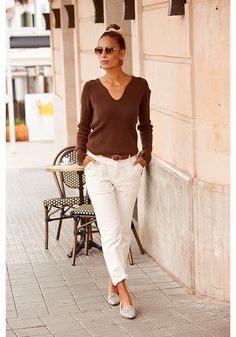 You will definitely want to add this classic V-neck sweater to your closet. Casual Brown V-neck Sweater For Work, Casual V-neck Sweater For Business Casual In Fall, Casual V-neck Sweater For Business Casual, Trendy V-neck Sweater For Workwear, V-neck Sweater For Business Casual, Spring V-neck Sweater For Business Casual, V-neck Fall Sweater For Business Casual, Women's Wear, V Neck Sweater