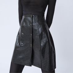 Faux Leather Black Mini Skirt With Buttons High Waist Faux Leather Mini Skirt For Work, Winter Faux Leather Mini Skirt, Faux Leather Workwear Skirt With Lining, Faux Leather Lined Skirt For Work, Chic Faux Leather Mini Skirt For Winter, Faux Leather Skirt For Workwear, Faux Leather Skirt For Winter, Chic Winter Faux Leather Skirt, Winter Workwear Faux Leather Mini Skirt