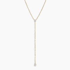 Pear Lab Diamond Bezel Lariat Necklace - 14K Yellow Gold. A chic classic, this lariat necklace features two bezel-set pear lab diamonds gracefully resting on a chain that can be adjusted to 18, 19, or 20 inches to suit individual preference (3/8 total carat weight). Classic Lariat Drop Necklace For Anniversary, Classic 14k Gold Lariat Necklace, Elegant Yellow Gold Teardrop Lariat Necklace, Classic Lariat Necklace With Delicate Chain, Classic Drop Necklace With Adjustable Chain, Classic Diamond Lariat Necklace, Engagement Ring Style Guide, Ring Style Guide, Tacori Engagement Rings