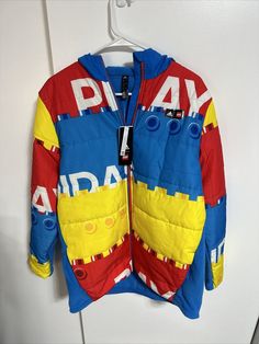 Adidas x Lego U Lego W Puffer Padded Jacket Retail Sz XL Youth NWT Multicolor Hooded Puffer Jacket, Multicolor Hooded Puffer Outerwear, Hooded Multicolor Puffer Outerwear, Casual Multicolor Winter Puffer Jacket, Multicolor Long Sleeve Puffer Outerwear, Casual Multicolor Puffer Jacket, Casual Multicolor Puffer Jacket For Outdoor, Casual Multicolor Long Sleeve Puffer Jacket, Casual Multicolor Adidas Outerwear