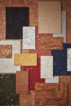 an assortment of different colors and shapes of wood