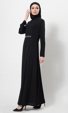 Featuring a beautiful modest wear flared asymmetrical abaya dress in nida fabirc adorned with crystal embellished motifs around the waist and pleated detailing on the upper bodice. It has flared bottom skirt, zipper closure placket at the back and pckets on the sides. Its a trendy and classic ensembl perfect to be worn for evening ocassions.FIT : Relaxed fit.COMPOSITION : Nida.CARE : Dry clean only. Long Sleeve Modest Abaya With Modesty Panel, Modest Long Sleeve Abaya With Modesty Panel, Long Sleeve Abaya With Modesty Panel For Fall, Modest Abaya With Modesty Panel For Spring, Spring Modest Abaya With Modesty Panel, Formal Maxi-length Abaya For Fall, Fall Long Sleeve Abaya With Modesty Panel, Fitted Abaya For Spring, Fitted Long Abaya For Spring