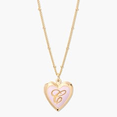 Straight from the heart, this necklace is a must have. We have fallen in love with the 14k gold plated heart shaped pendant that is engraved with your or a special someone’s initials on a long cable chain. This pendant makes a sweet gift for the one you love! R Necklace, Enamel Locket, Preppy Jewelry, Antique Locket, Straight From The Heart, Heart Shaped Pendant, Heart Shaped Jewelry, Bow Jewelry, Dope Jewelry