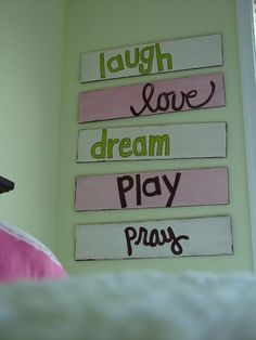 a sign that says laugh laugh love dream play pray