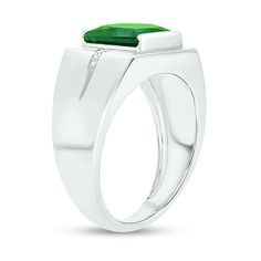 He'll love the eye-catching color of this modern ring. Crafted in cool 10K white gold, this design features a 9.0mm channel-set square-cut verdant-green lab-created emerald. Inlaid rows of diamond accents flank the center and continue along the grooved shank. Buffed to a brilliant luster, this ring makes a bold statement of style. Modern Green Signet Ring For Anniversary, Modern Green Rings With Prong Setting, Modern Green Diamond Anniversary Ring, Modern Green Diamond Rings, Modern Emerald Ring With Polished Finish For Promise, Modern Emerald Promise Ring With Polished Finish, Modern Emerald Rings With Center Stone, Modern Emerald Ring Vvs Clarity For Promise, Modern Diamond Signet Ring With Gemstone