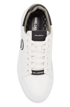 An Iconic Karl Lagerfeld image details the sides of these crisp white sneakers for casual days. Round toe Lace-up vamp Padded collar White sole Leather and synthetic upper, synthetic sole Imported White Low-top Platform Sneakers With Logo Detail, White Leather Platform Sneakers With Logo, Casual Lace-up Sneakers With Logo, White Low-top Platform Sneakers With Logo, White Lace-up Sneakers With Logo Detail, White Sporty Platform Sneakers With Logo, Classic White High-top Sneakers With Logo Print, High-top White Platform Sneakers With Logo, White High-top Platform Sneakers With Logo