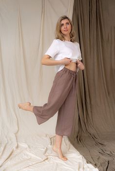 Relaxed style with fair made linen trousers. MyLinenSould pants are elastic high-waisted linen pants, that you can wear anywhere anytime. Natural linen pants with pockets is so comfortable. Loose fit silhouette delivers resort-inspired look. Handmade linen pants is finished with side pockets and tie detail at the waist line. Elasticated waist band is super soft so you won't feel any pressure or discomfort.  Model in picture is 5.6ft (172cm) tall. She is wearing size S Please check our SIZE CHART Non-stretch Linen Beach Bottoms, High Waist Beige Linen Bottoms, Non-stretch High-waisted Linen Pants, Non-stretch Linen Harem Pants For Spring, Non-stretch Linen Wide Leg Pants For Vacation, Beige Linen High-waist Wide Leg Pants, High Waist Linen Pants With Relaxed Fit, High-waisted Linen Bottoms In Flax, High-waisted Linen Bottoms In Flax Color