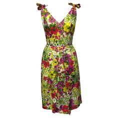 With a vibrant richly-colored floral pattern in vintage cotton fabric lined with 100% silk charmeuse, this dress will make you feel confident and radiant at any occasion. The silhouette featuring shoulder-tie straps, inverted pleat, and a fit-and-flare style is both flattering and sweet. This versatile day-to-evening dress would be lovely to twirl and dance around in or fitting for a garden party. Truly unique and remarkable! Black Slim Dress, Happy Dresses, Midi Wrap Dress, 1980s Dresses, Floral Fit, Apron Dress, Shift Dress Black, Cotton Coat, Silk Charmeuse