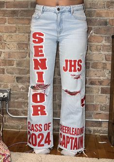 Please message me before purchasing so we can discuss your vision for your custom jeans. I will then let you know which option to choose when checking out! Price is based off of the amount of time it will take me to make your jeans. (price does not include the jeans, only the customization) Senior Jeans Orange And Blue, Spirt Jeans Homecoming, Senior Hoco Jeans Ideas, Senior Jeans Red And Black, Custom Senior Jeans, Diy Senior Jeans, Senior Pants 2025, Spirit Week Jeans, Senior Pants Ideas 2025