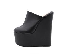 Take your wardrobe to new heights with these Always Confident Extreme Wedge Heels. Featuring a black PU material with a closed toe design and an extreme platform height, we're obsessed. Black Wedge Sandals With Thick Bottom, Black High Heel Platform Wedge Sandals, Black High Heels With Thick Bottom, Black Chunky Platform Wedge Sandals, Party Platform Wedge Boots, Party Wedge Boots With Platform, Black Closed Toe Heels With Thick Bottom, Black Platform High Heel Wedge Boots, Black Platform Wedge Boots For Party