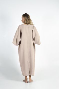 "This carefully tailored women's ONE SIZE dress is made of cool and light pure linen. It's a stylish outfit for women with distinct taste, for any occasion. NO BUTTONS, NO BUTTONHOLES, NO ZIPS ZERO SHRINKAGE FITTING: The model appearing in the photo is 176cm (5' 9\") tall. Because of the kaftan's loose style ONE size FITS ALL. ONE SIZE -RECTANGULAR PATTERN BUST-WAIST-HIPS 134cm/ 53\" LENGTH 130CM / 51\" Thank you for shopping from YUMElabel. Enjoy this beautiful linen garment !" Oversized Linen V-neck Dress, Oversized Linen V-neck Tunic, Long Linen Kaftan, Oversized Linen Bohemian Kaftan, Beige Kaftan For Spring Daywear, Oversized Linen Lagenlook Dress, Oversized Beige Tunic For Spring, Bohemian Linen Kaftan With Relaxed Fit, Beige Linen Tunic With Relaxed Fit