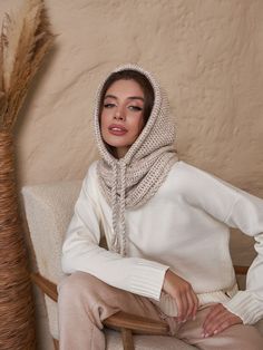 Beige Wool Balaclava Hat, Women Knit Balaclava, Knitted Women Hood, Winter Hat, Knit Hood, Neck Warmer, Trending Now, Outdoors Gift The trendy version of the headdress is a snood hood made of cozy warm wool blend yarn. The model of comfortable volume is combined with a collar that covers the base of the neck and replaces a scarf. The hood has a drawstring with a twisted cord to adjust the fit along the edge. Leave this scarf on after you take off your jacket, it will become a stylish addition to Knit Crochet Hat For Cold Weather, Winter Crochet Knit Hat, Cream Knitted Beanie For Winter, Knitted Cream Beanie For Winter, Warm Knit Crochet Hat For Winter, Cozy Knit Crochet Hat For Winter, Warm Knit Crochet Winter Hat, Cozy Knit Crochet Winter Hat, Winter Knit Bonnet