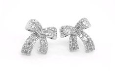 18kt White Gold Ribbon Earrings with diamonds 0.34 carats. Perfect gift for Christmas, Mom, Girlfriend, Daughter, Graduation, Birthday and more. Daughter Graduation, Ribbon Earrings, Gold Ribbon, Christmas Mom, Bow Earrings, Gold Ribbons, Baddie Hairstyles, Gift For Christmas, Jewelry Cleaner