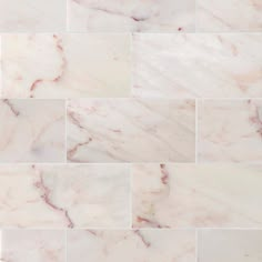 white and pink marble tiles are arranged in rows