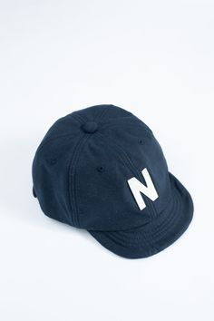 These are quite the staple accessory at the shop now. From the short brim to the fact that they're lightweight and breathable, they were an instant yes. They have a classic baseball brim style, but nothing about these is classic. They are using modern techniques to weave the fabric from which this style is born. This is their iconic "Back Nep" fabric which has a ton of fleck and character. You can now wear back nep from head to toe. 100% Cotton Leather Closure Produced in Jackman factory in Fukui prefecture table { border-collapse: collapse; width: 100%; } th, td { border: 1px solid black; padding: 8px; text-align: center; } Size Around the Head One Size 22.44-26.38" A variance of +/-.5" is within tolerance. Fit Notes: These have a one-size notation, but they probably wouldn't be the best Classic Sports Dad Hat, Classic Six-panel Baseball Cap, Classic Six-panel Sports Hat, Classic Hats For Baseball Season Streetwear, Classic Short Brim Baseball Cap For Streetwear, Classic Six-panel Trucker Hat, Classic Curved Brim Baseball Cap, Classic Baseball Cap For Streetwear, Classic Six-panel Fitted Hat For Sports